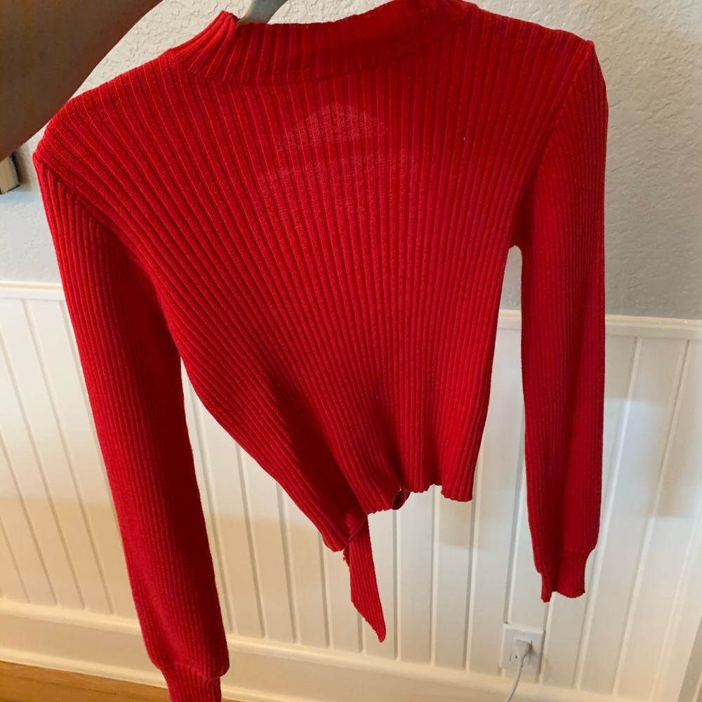 Red tight sweater